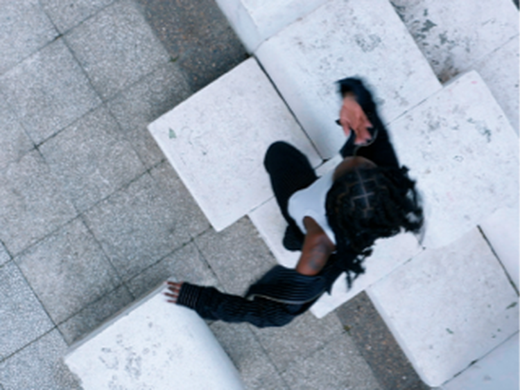 Banner with overhead view of Cassie Badgyal dancing