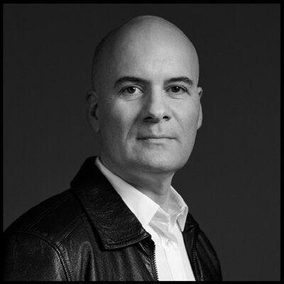 Black and white photo of Stephan Bezy, International General Manager at YSL Beauty.