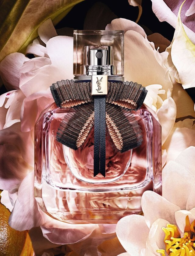 Mon Paris Eau de Toilette Lumiere surrounded by flowers