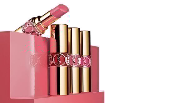 Gold wire basket with YSL favorites